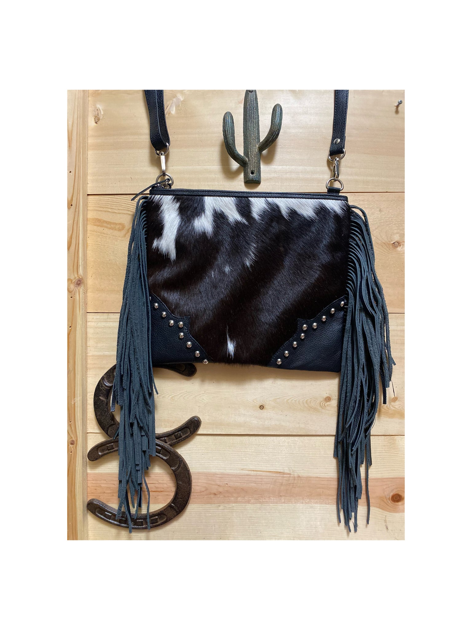 Black and white cowhide purse