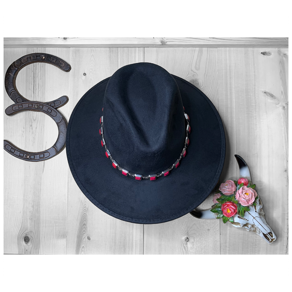 Cowgirl hat with red stone and silver hat band